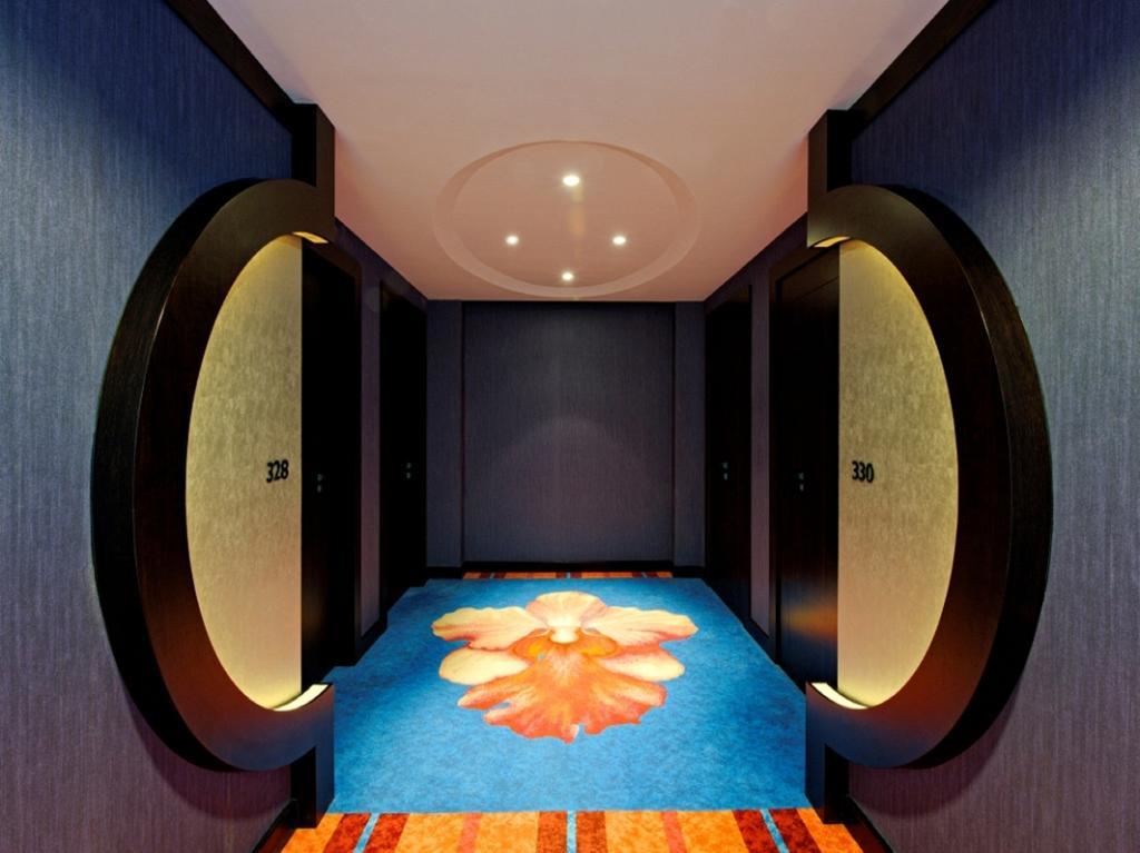 Resorts World Sentosa - Festive Hotel Σιγκαπούρη Εξωτερικό φωτογραφία The entrance to the hotel's rooms