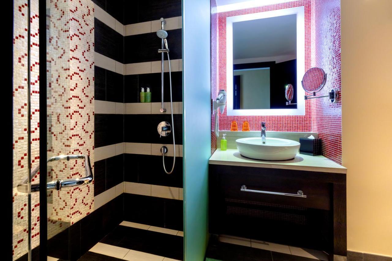 Resorts World Sentosa - Festive Hotel Σιγκαπούρη Εξωτερικό φωτογραφία Bathroom